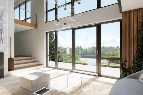 MB-70HI aluminiumfönster och PSK-partier installerade i vardagsrum med utsikt mot skogen – modern och energieffektiv lösning