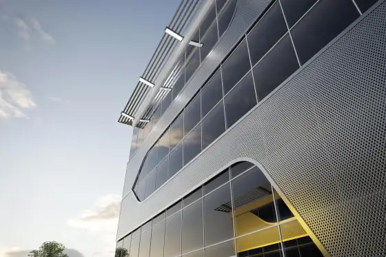 Innovativ fasaddesign med glas och perforerade aluminiumytor – MB-SR50N HI system på en modern kontorsbyggnad